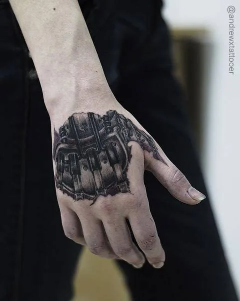 black and grey biomechanical татуировка на back of hand #27002 | Тату мастер Andrew X Tattooer