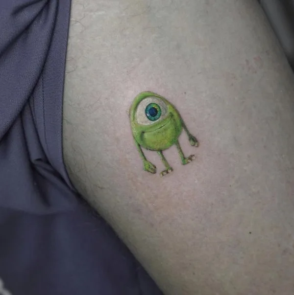 color cartoon tatuaje en upper arm #67578 | Tatuador Dencz Orsolya