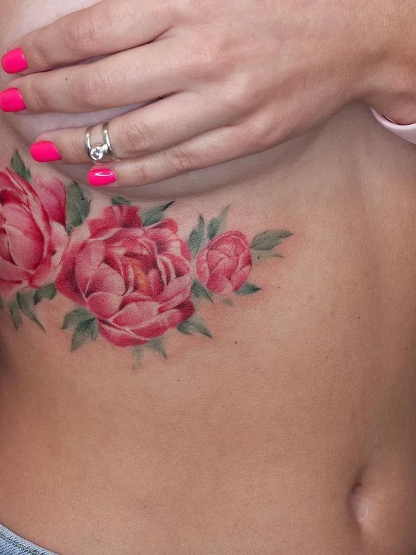 female color realism tatuaje en ribcage #43822 | Tatuador Алексей Панченко