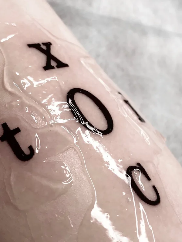 black lettering tatouage sur forearm #49972 | Artiste tatoueur Евгения Стрелецкая