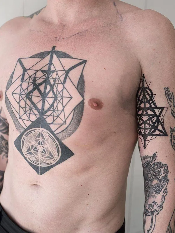 male black geometric tattoo on chest #31032 | Tattoo Artist Maxime Plescia-Buchi
