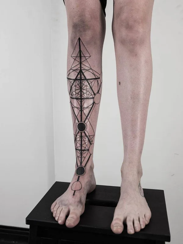 black geometric tattoo on calf #31028 | Tattoo Artist Maxime Plescia-Buchi