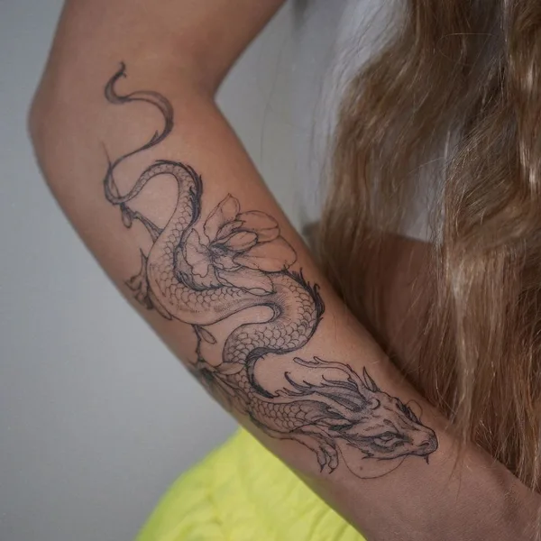 Graphic tattoo by Полина Матвеева in Saint Petersburg