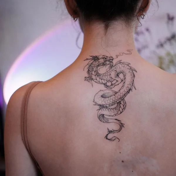 Graphic tattoo by Полина Матвеева in Saint Petersburg