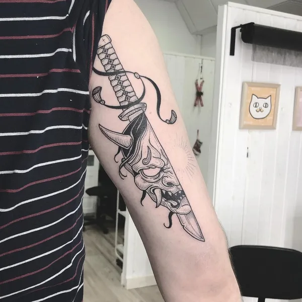 Graphic tattoo by Филипп Болвинов in Moscow