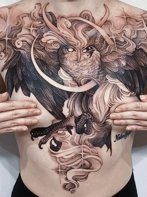 Graphic tattoo by Michael George Pecherle in Toronto