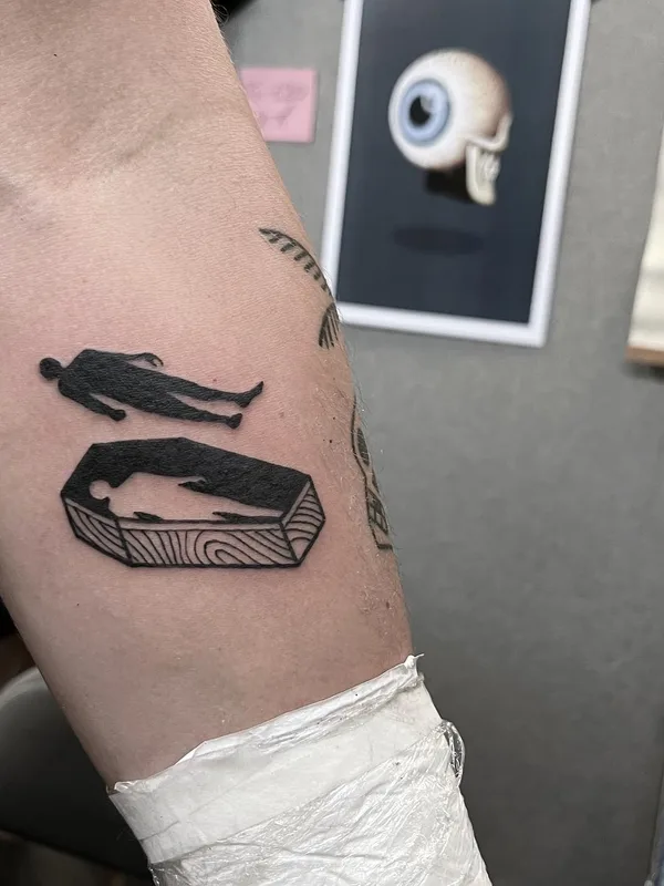 Graphic tattoo by Iain Sellar in Bristol