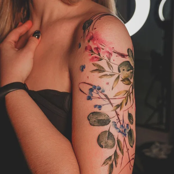 Feminine tattoo by Diana Ivashkevich in Bautzen