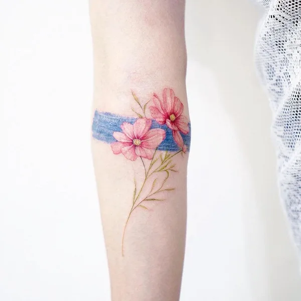 Feminine tattoo by Mini Lau in Hong Kong