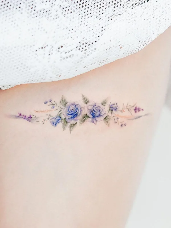 female color watercolor tattoo auf thigh #44322 | Tätowierer Mini Lau