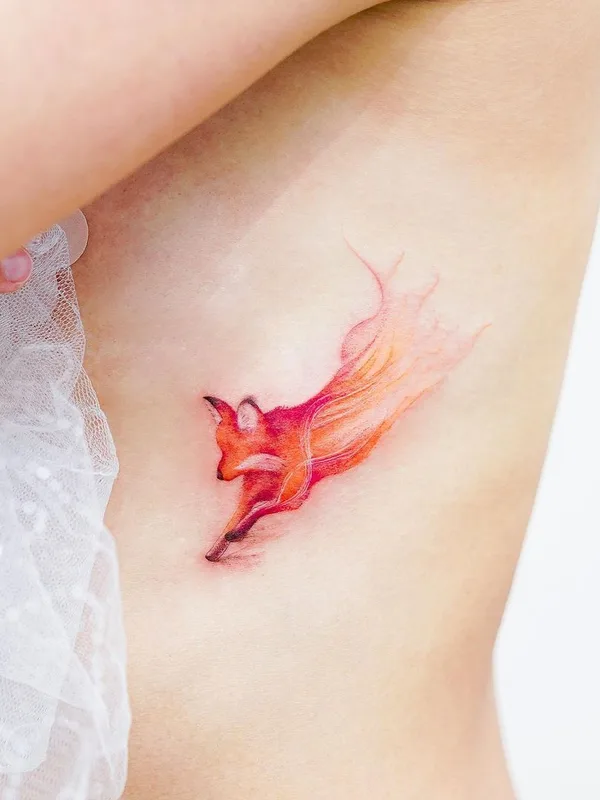 female color watercolor tattoo auf ribcage #44324 | Tätowierer Mini Lau