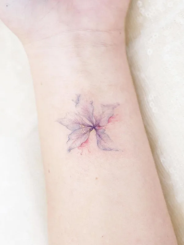 female color watercolor tattoo auf wrist #44328 | Tätowierer Mini Lau