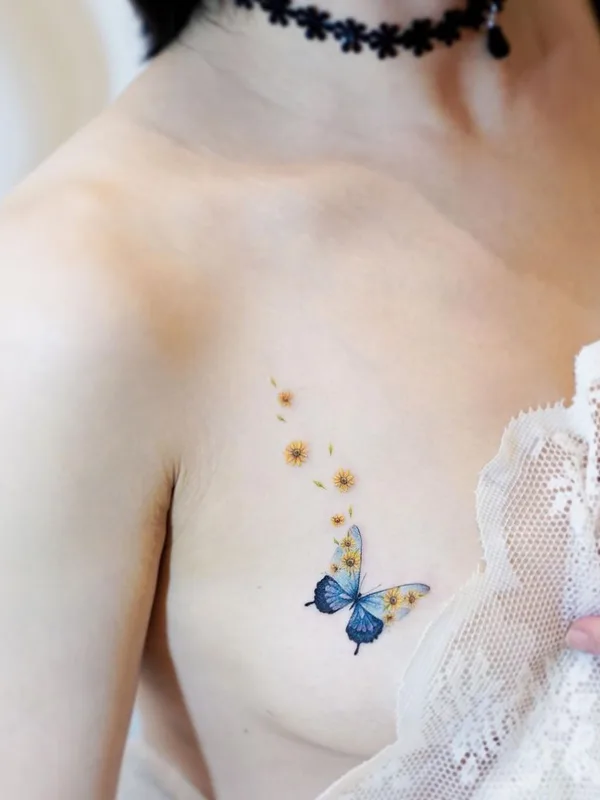 female color watercolor tattoo auf chest #44329 | Tätowierer Mini Lau