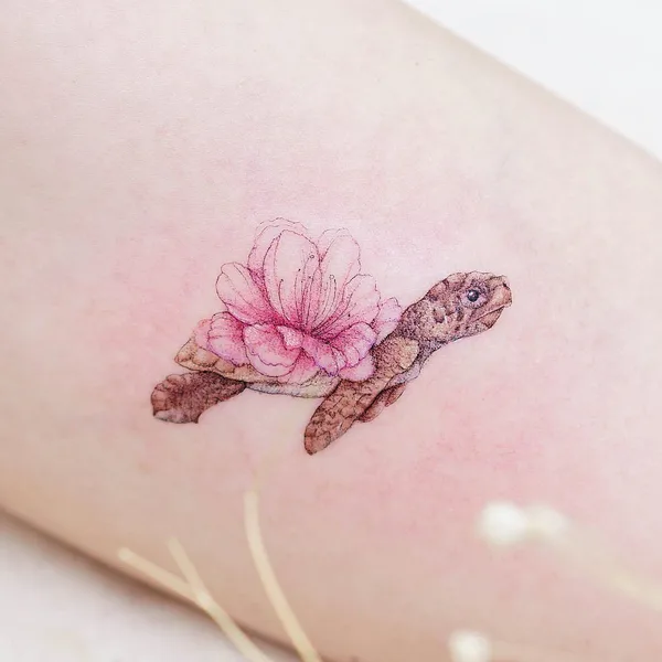Feminine tattoo by Mini Lau in Hong Kong