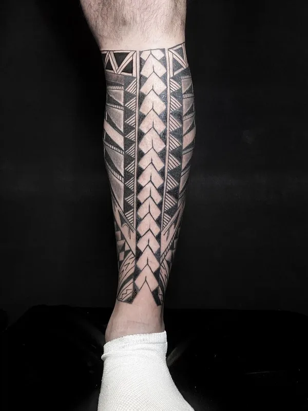 male black and grey tribal tattoo on calf #63982 | Tattoo Artist @javieracero