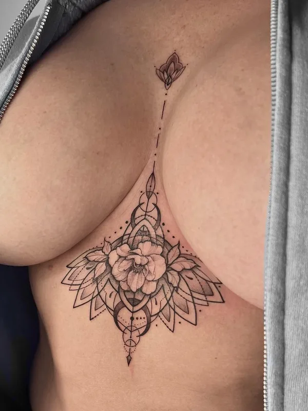 female black and grey ornamental татуировка на sternum #64022 | Тату мастер @ikova_ink
