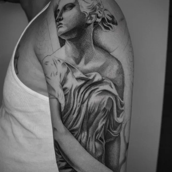 Graphic tattoo by Raul Dares in Miami