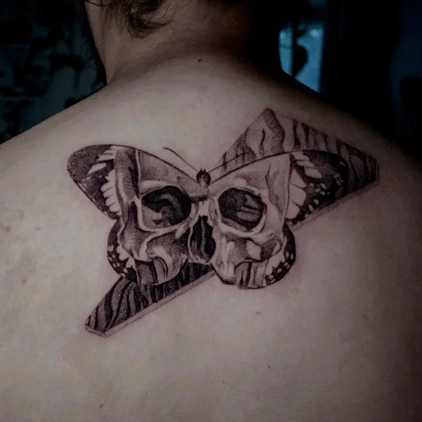 Graphic tattoo by Raul Dares in Miami