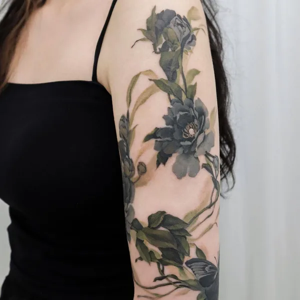 Botanical tattoo by guppy.flowertattoo in Seoul