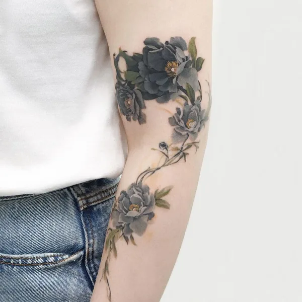 Botanical tattoo by guppy.flowertattoo in Seoul