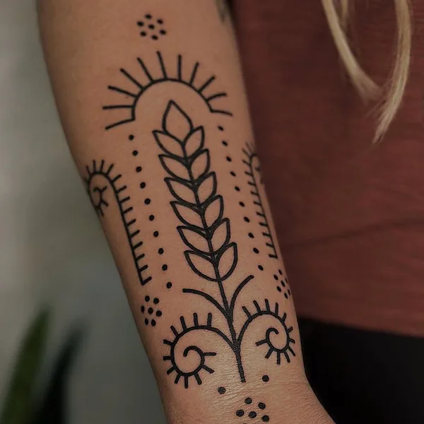 Ornamental tattoo by Amber Muse in Long Beach
