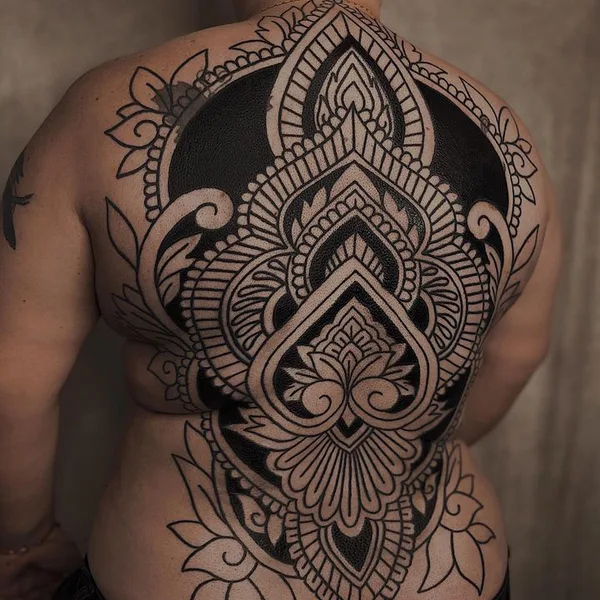 Ornamental tattoo by Amber Muse in Long Beach