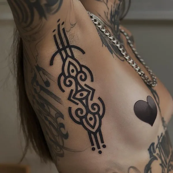 Ornamental tattoo by Amber Muse in Long Beach
