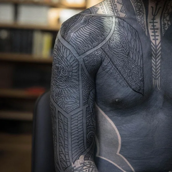 Ornamental tattoo by Thomas Hooper in County of East Sussex
