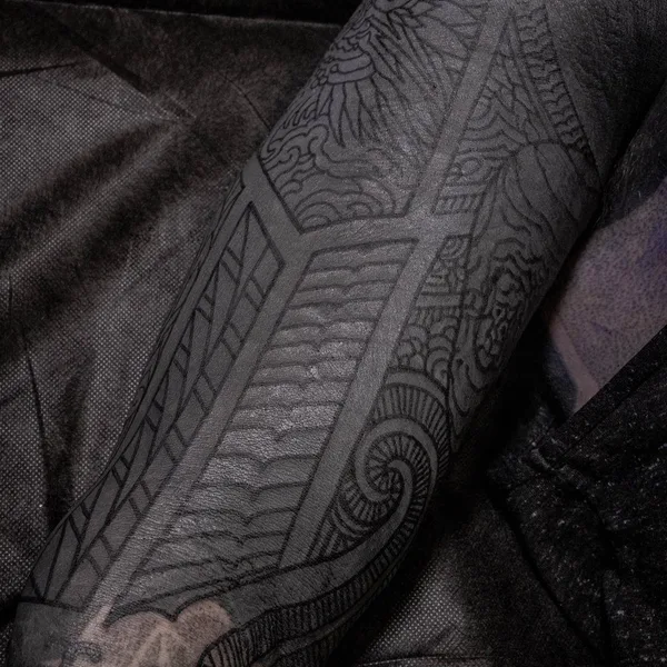 Ornamental tattoo by Thomas Hooper in County of East Sussex