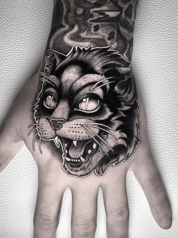 black and grey blackwork татуировка на back of hand #54246 | Тату мастер Josh Hurrell