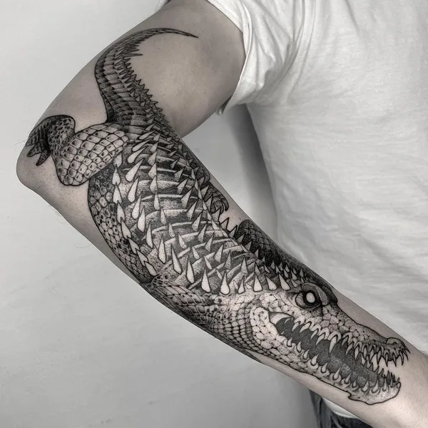 Graphic tattoo by Erick Cuevas in Guadalajara