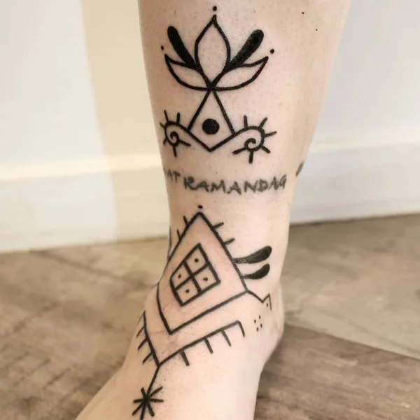 Ornamental tattoo by Candice Soleillant in Essertines-en-Châtelneuf