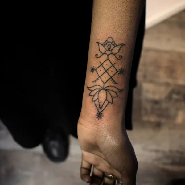 Ornamental tattoo by Candice Soleillant in Essertines-en-Châtelneuf