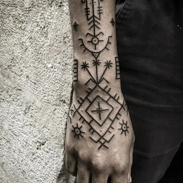 Ornamental tattoo by Candice Soleillant in Essertines-en-Châtelneuf