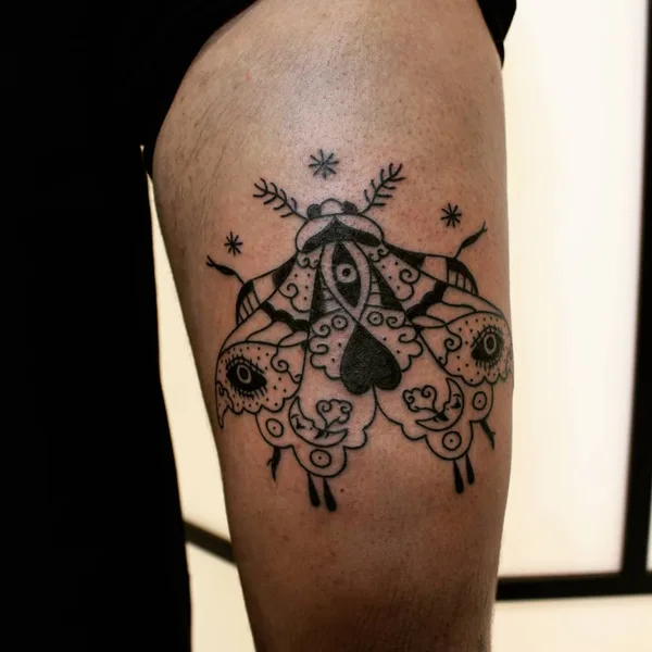 Ornamental tattoo by Candice Soleillant in Essertines-en-Châtelneuf