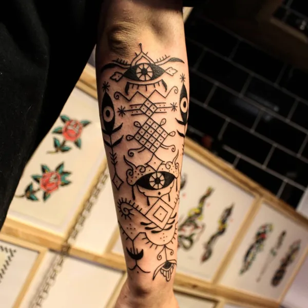 Ornamental tattoo by Candice Soleillant in Essertines-en-Châtelneuf