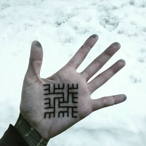 Ornamental tattoo by Candice Soleillant in Essertines-en-Châtelneuf
