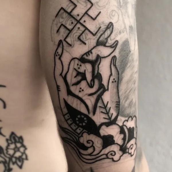 Ornamental tattoo by Candice Soleillant in Essertines-en-Châtelneuf