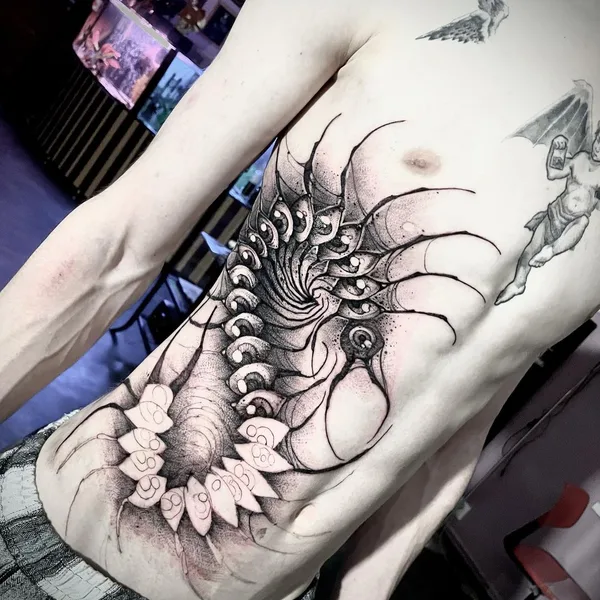 Graphic tattoo by Иджи Тредгуд in Казань