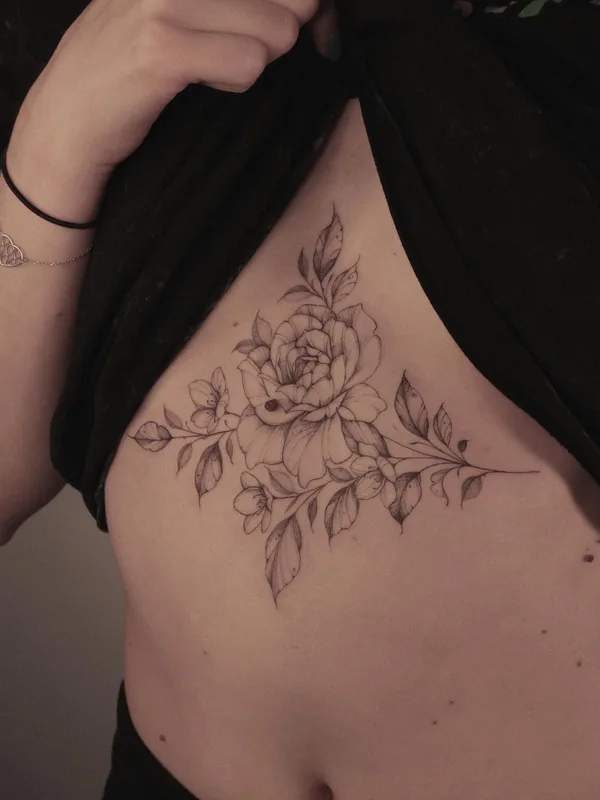Feminine tattoo by Krysz in Wrocław