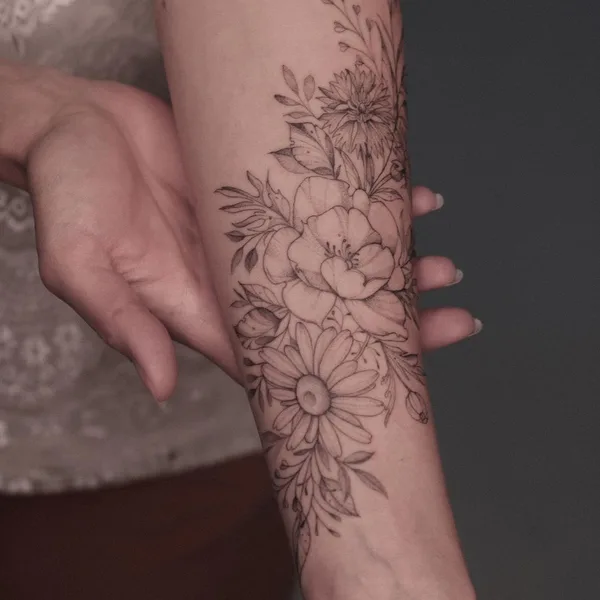 Feminine tattoo by Krysz in Wrocław
