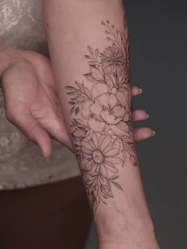 Feminine tattoo by Krysz in Wrocław