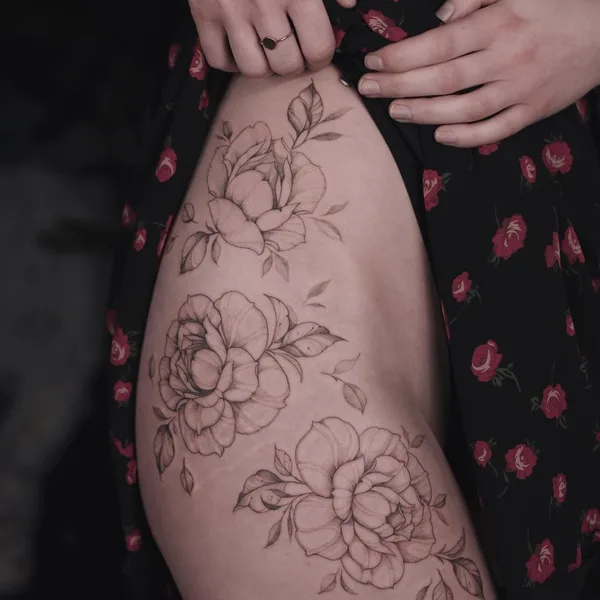 Feminine tattoo by Krysz in Wrocław