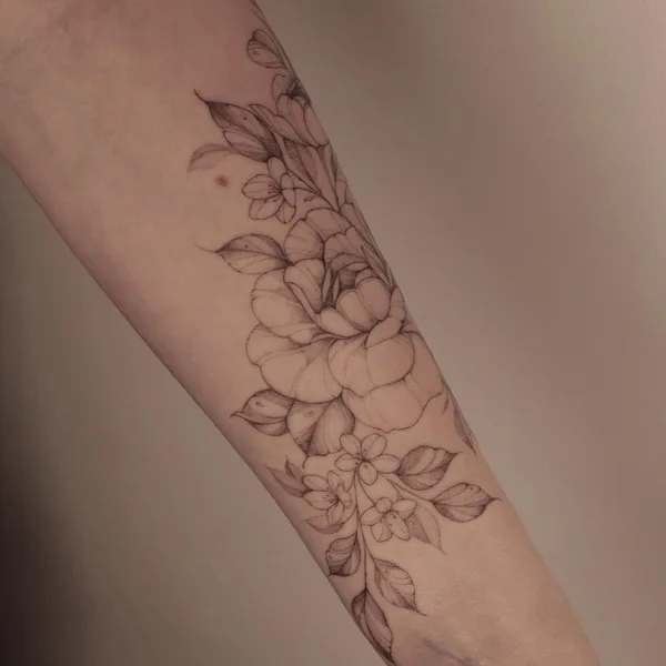 Feminine tattoo by Krysz in Wrocław