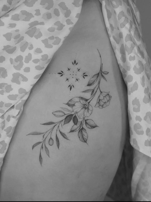 Feminine tattoo by Krysz in Wrocław