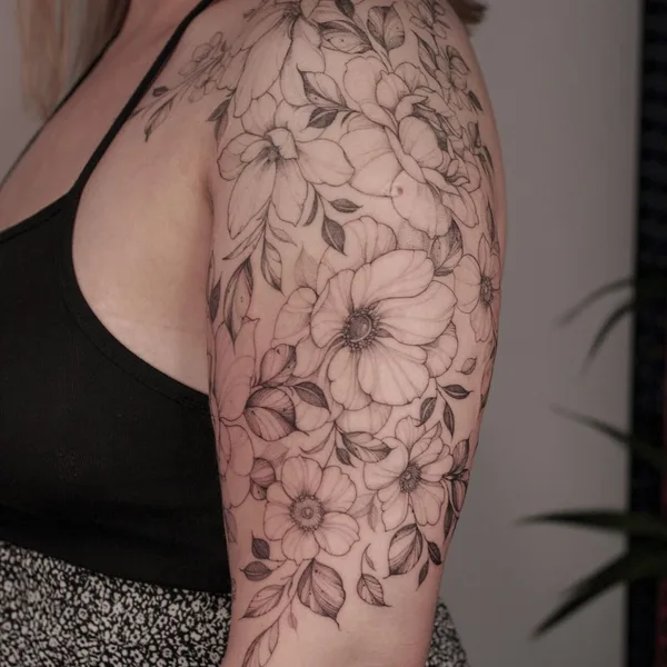 Feminine tattoo by Krysz in Wrocław