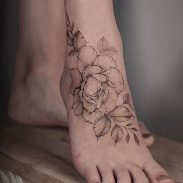 Feminine tattoo by Krysz in Wrocław
