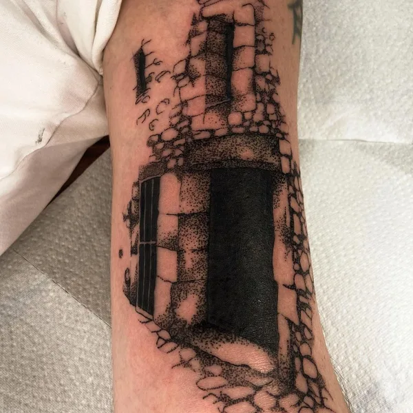 Graphic tattoo by Mackenzie in Düsseldorf