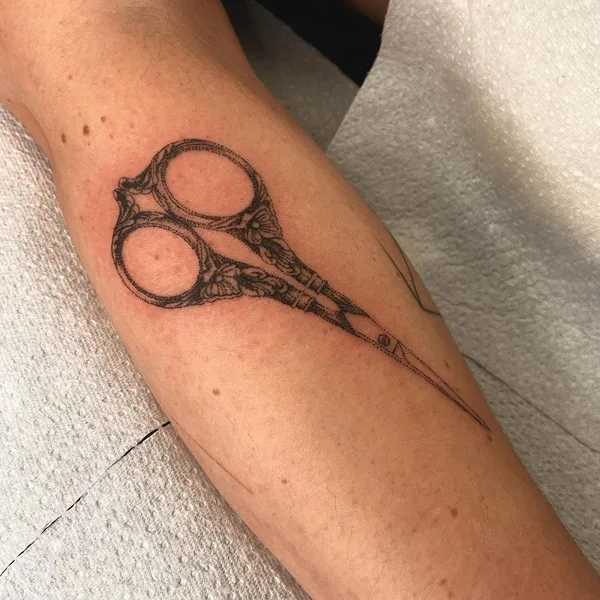 Graphic tattoo by Mackenzie in Düsseldorf