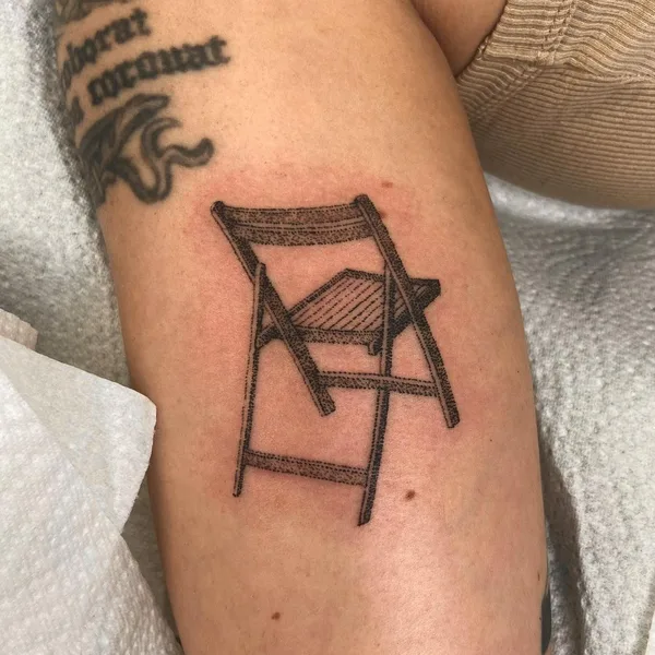 Graphic tattoo by Mackenzie in Düsseldorf
